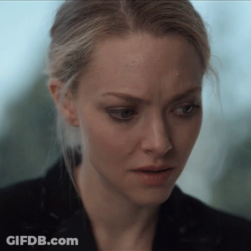 Close Up Of Woman With Serious Look GIF