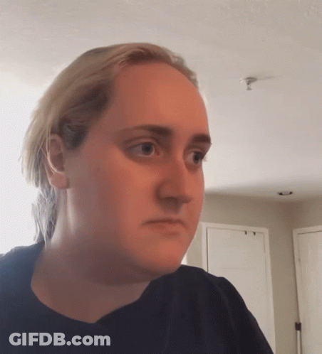 Close Up Of Woman With Serious Look GIF