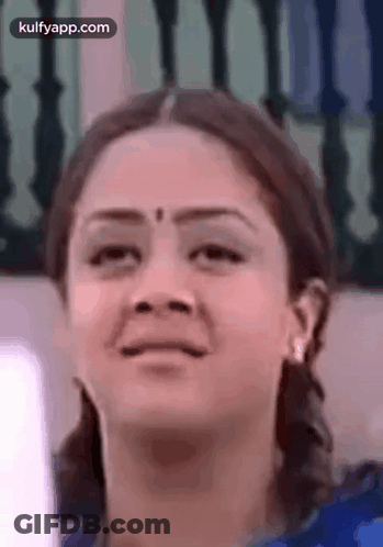 Close Up Of Woman With Serious Look GIF