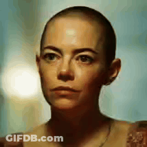 Close Up Of Woman With Shaved Head GIF