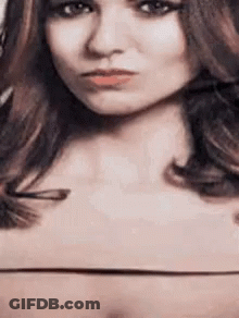 Close Up Of Woman With Slight Smirk GIF