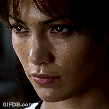 Close Up Of Woman With Tear Running Down Cheek GIF