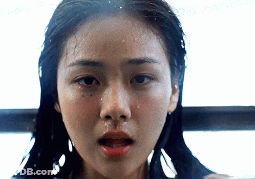 Close Up Of Woman With Wet Hair GIF