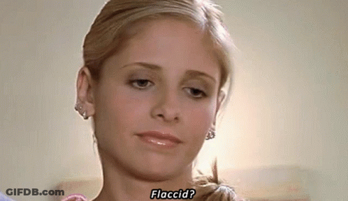 Close Up Of Woman With Word Flaccid GIF