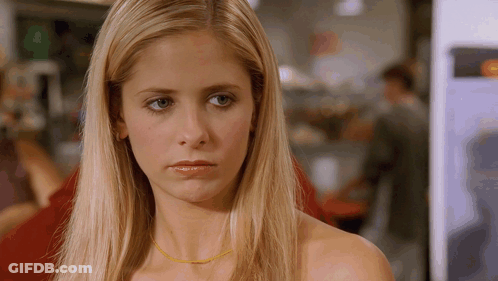 Close Up Of Woman With Yellow Necklace GIF