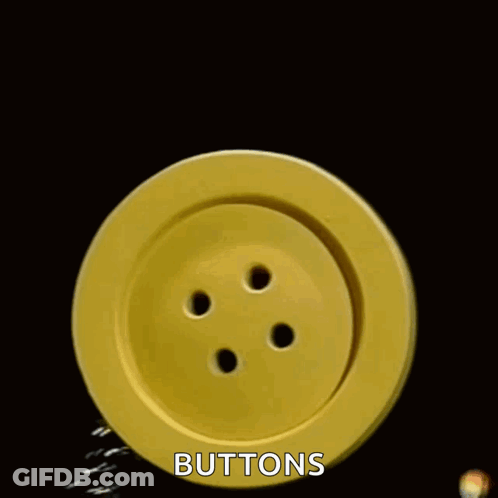 Close Up Of Yellow Button With Buttons Below GIF