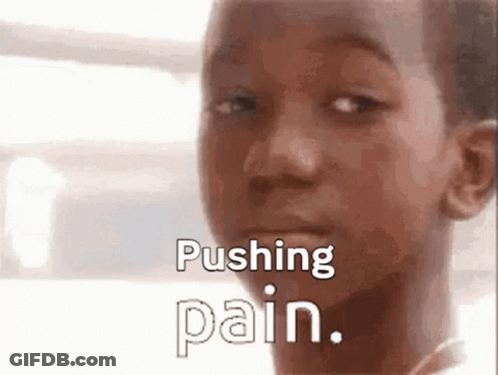 Close Up Of Young Boy Pushing Pain GIF
