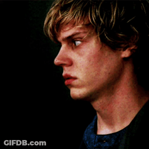 Close Up Of Young Man Face With Black Background GIF
