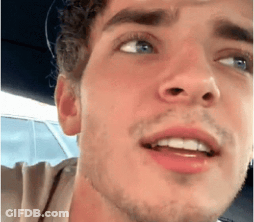 Close Up Of Young Man's Bearded Face GIF