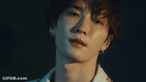 Close Up Of Young Man's Face With Shadow GIF