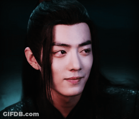 Close Up Of Young Man With Long Black Hair GIF