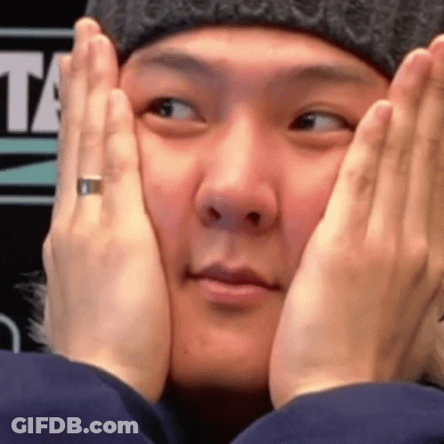 Close Up Person Covering Face With Hands GIF