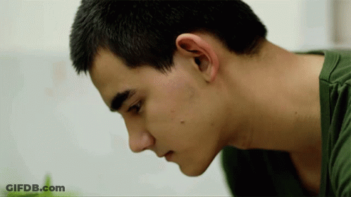 Close Up Person Face Green Shirt GIF
