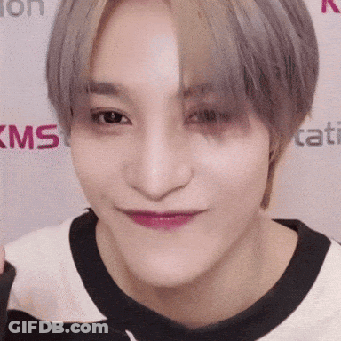 Close Up Person Face With KMS Logo GIF
