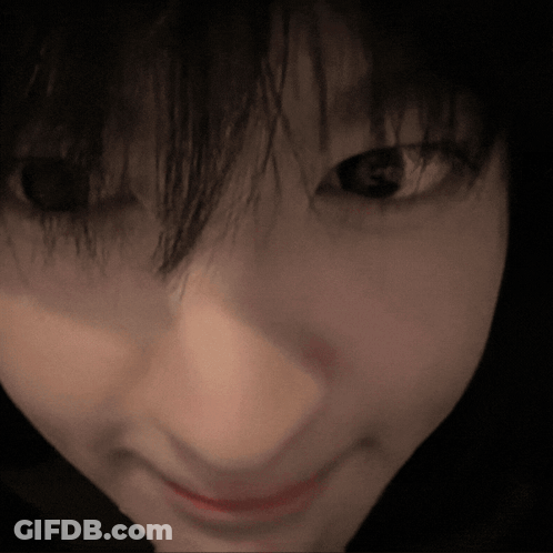 Close Up Person In Blue And White Striped Sweater With Necklace GIF