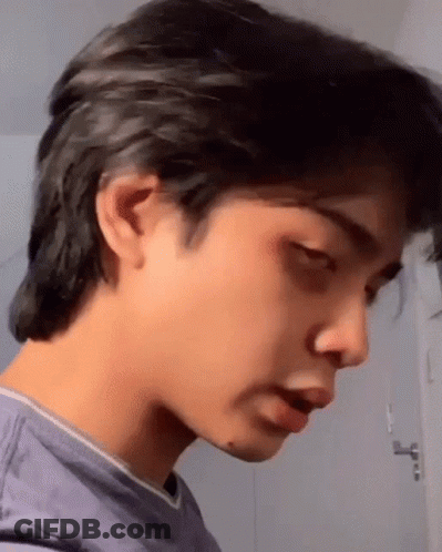Close Up Person In Purple Shirt GIF