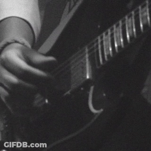 Close Up Person Playing Guitar GIF