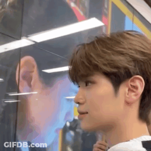 Close Up Person's Face Another's Reflection Mirror GIF