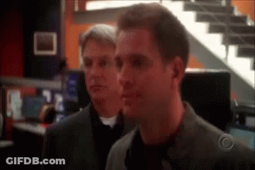 Close Up Person's Face Blue Background GIF