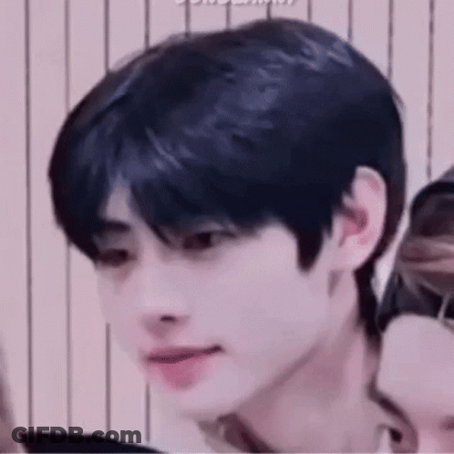 Close-Up Person's Face With Group GIF