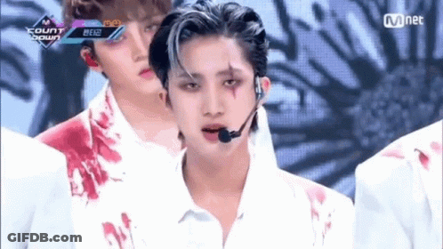 Close Up Person's Face With Teeth And Mask GIF