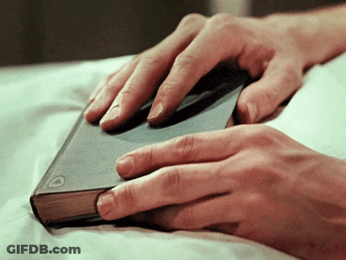 Close-Up Person's Finger With Black Paint GIF