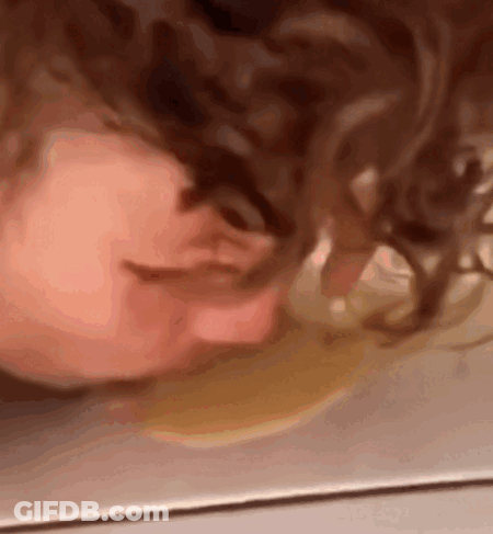 Close Up Person's Head On Floor GIF