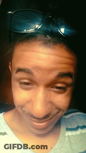 Close Up Person Smiling With Pink Eyes GIF