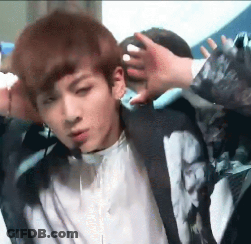 Close Up Person Touching Another's Head GIF