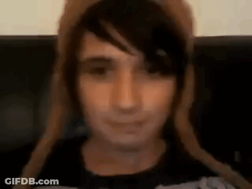 Close Up Person Wearing Hat And Black Shirt GIF