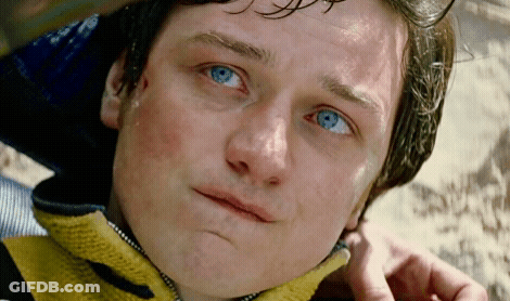 Close Up Person With Blue Eyes And Yellow Jacket GIF