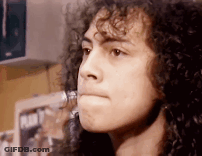 Close Up Person With Curly Hair Looking GIF