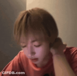 Close Up Person With Eyes Closed And Red Shirt GIF