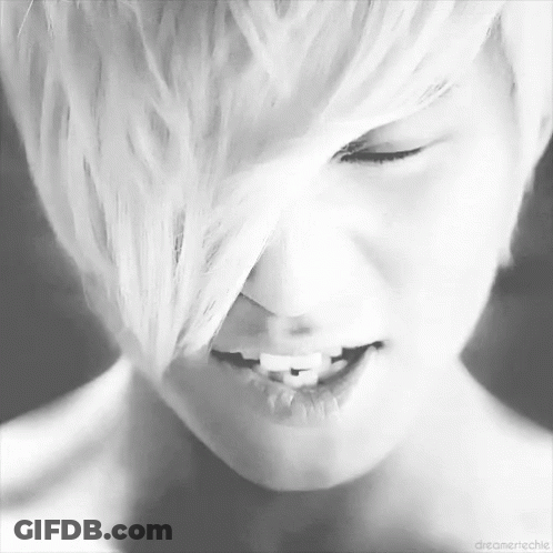 Close Up Person With Eyes Closed And White Hair GIF