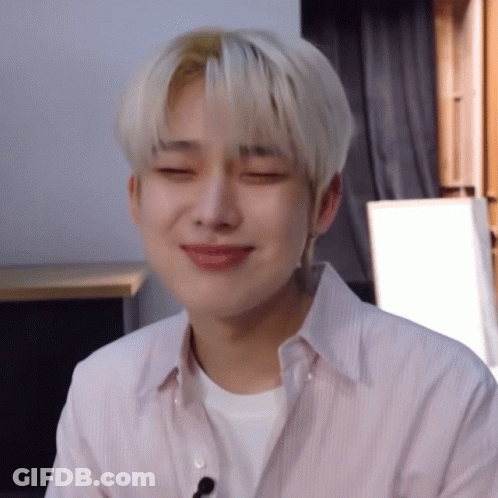 Close Up Person With Eyes Closed And White Shirt GIF