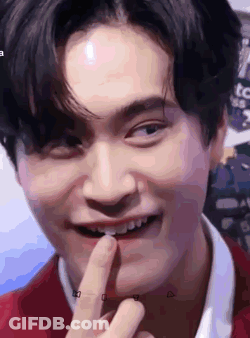 Close-Up Person With Finger In Mouth GIF
