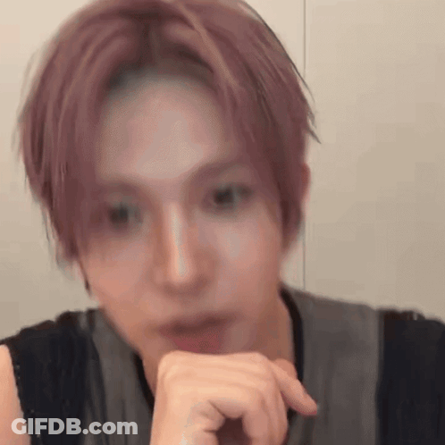 Close Up Person With Hand On Chin GIF