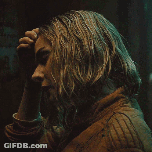 Close Up Person With Hand On Forehead GIF