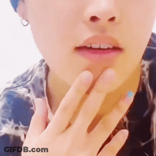 Close Up Person With Hand On Neck GIF