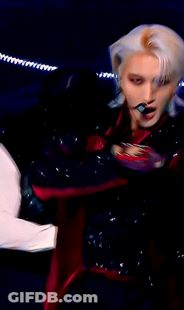 Close Up Person With Microphone In Mouth GIF