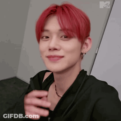 Close-Up Person With Red Hair And Black Jacket GIF