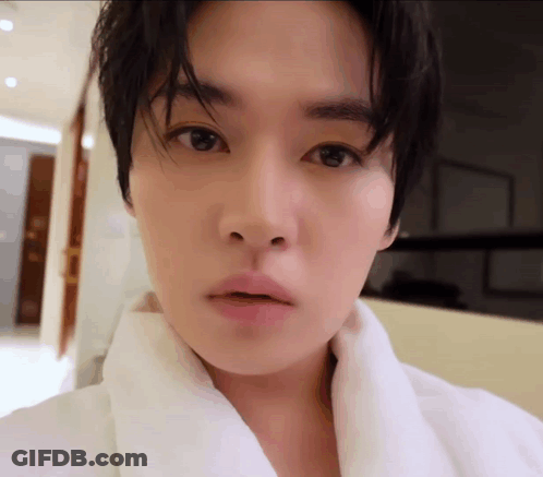 Close Up Person With White Towel Around Neck GIF