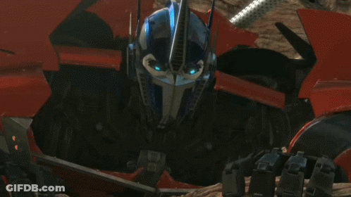 Close Up Robot Face With Blue Eyes GIF