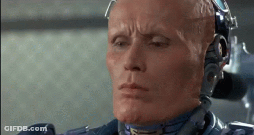 Close Up Robot Face With Eyes Closed GIF