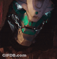Close Up Robot Face With Green Eye GIF