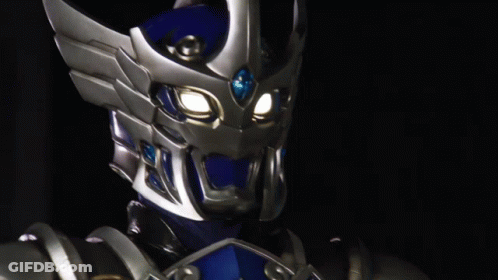 Close Up Robot Face With Lit Eyes GIF