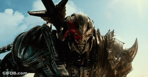 Close Up Robot With Blood On Face GIF