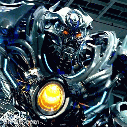 Close Up Robot With Red Eyes And Yellow Light GIF
