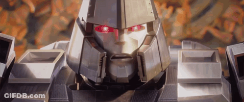 Close Up Robot With Red Eyes Looking At Camera GIF