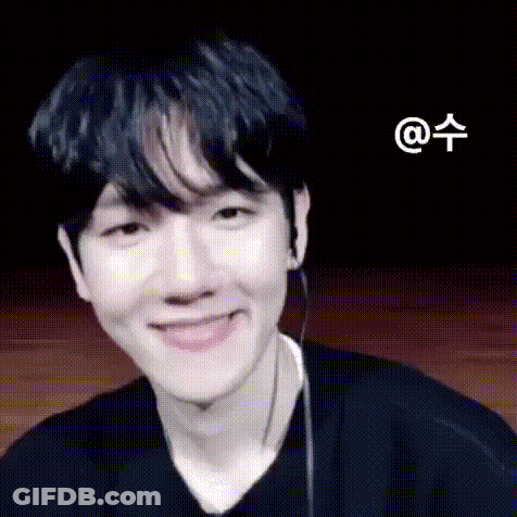 Close Up Smiling Face Black Background GIF